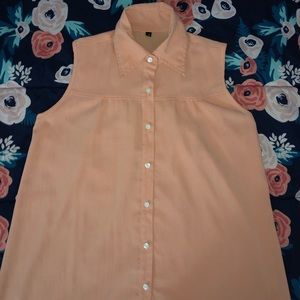 Salmon colored blouse